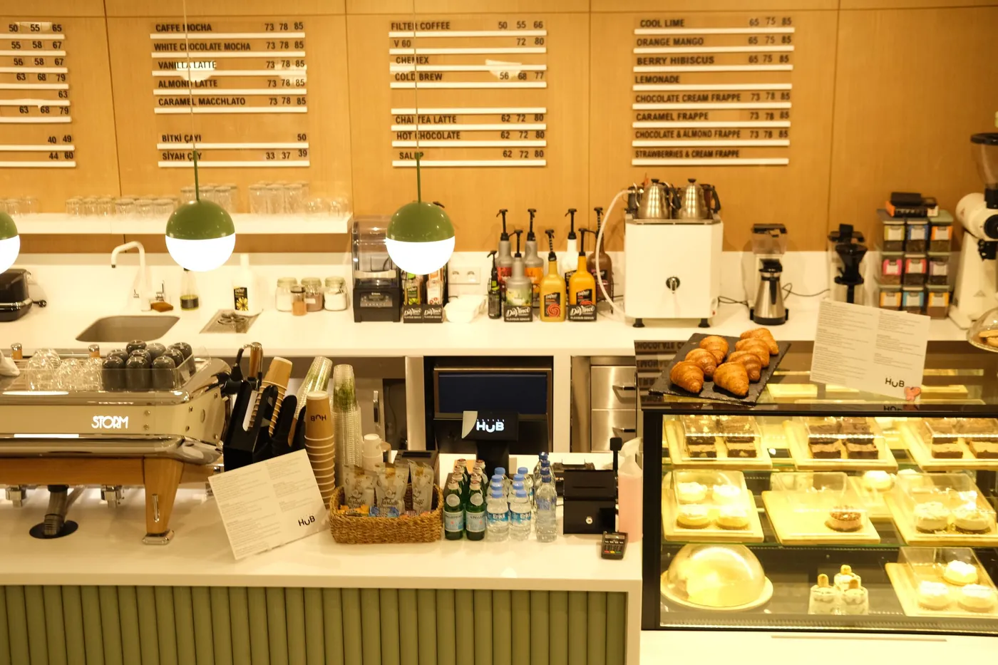 Bakery counter with a display case and back shelving